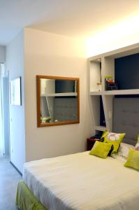 Postel nebo postele na pokoji v ubytování Hotel Hermitage
