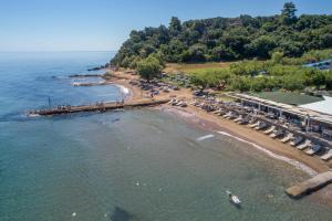 an aerial view of a beach with a resort at Fiore Beach Studios in Vasilikos