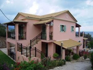 a house with a view of the ocean at Villa Pepy in Mesongi