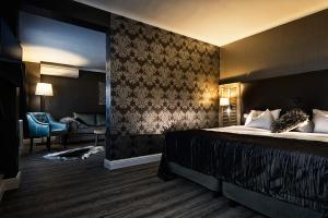 Ein Bett oder Betten in einem Zimmer der Unterkunft Hotel Mardaga