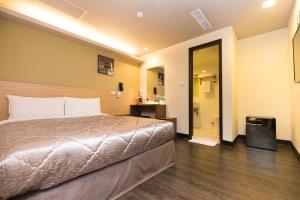 Postel nebo postele na pokoji v ubytování Chance Hotel