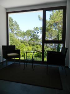Ein Sitzbereich in der Unterkunft Hotel Alén do Mar