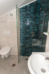 Koupelna v ubytování Hotel Rendez Vous