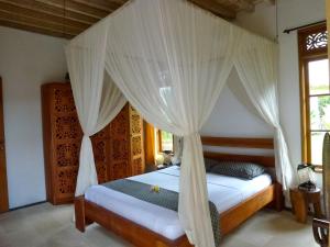Letto o letti in una camera di Two Smiling Buddhas