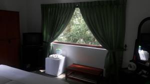 Postel nebo postele na pokoji v ubytování KANDY Holiday Residence