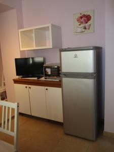 Een keuken of kitchenette bij Appartamenti Di Laura