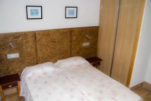 Cama o camas de una habitación en Pensión Trinidad