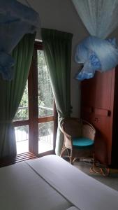Postel nebo postele na pokoji v ubytování KANDY Holiday Residence