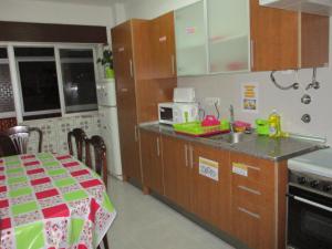 New AQUARIUM - Guesthouseにあるキッチンまたは簡易キッチン