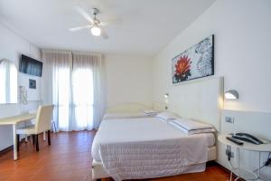 TV a/nebo společenská místnost v ubytování Hotel Palos