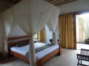 Letto o letti in una camera di Two Smiling Buddhas