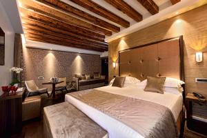 Posteľ alebo postele v izbe v ubytovaní Rosa Salva Hotel
