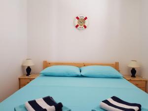 Postel nebo postele na pokoji v ubytování Apartment Ruzmarin