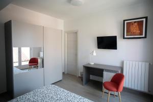 TV a/nebo společenská místnost v ubytování Sud Est Guest House