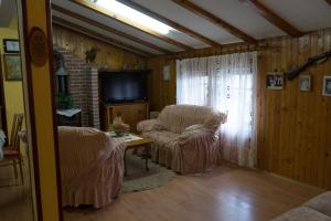 TV i/ili multimedijalni sistem u objektu Apartmani Teodor