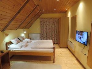 Ein Bett oder Betten in einem Zimmer der Unterkunft Guesthouse Stefanac