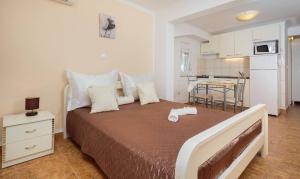 Postel nebo postele na pokoji v ubytování Apartment Krželj