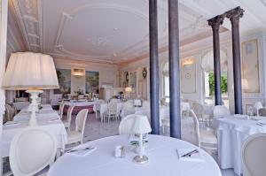 A restaurant or other place to eat at Hotel De Paris Sanremo