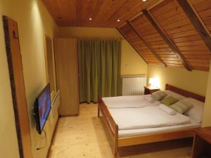 Ein Bett oder Betten in einem Zimmer der Unterkunft Guesthouse Stefanac