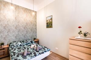 Posteľ alebo postele v izbe v ubytovaní BpR D8 Premier Apartment