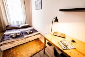 Posteľ alebo postele v izbe v ubytovaní BpR D8 Premier Apartment