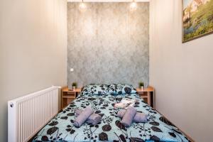 Posteľ alebo postele v izbe v ubytovaní BpR D8 Premier Apartment