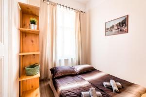 Posteľ alebo postele v izbe v ubytovaní BpR D8 Premier Apartment