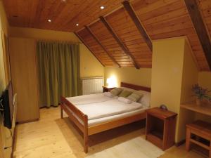 Ein Bett oder Betten in einem Zimmer der Unterkunft Guesthouse Stefanac