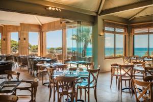 Restaurant o un lloc per menjar a 3HB Falésia Garden