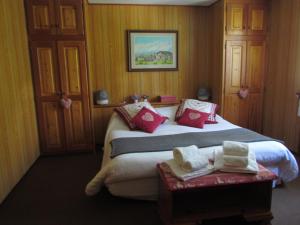 En eller flere senger på et rom på Hotel Lysjoch