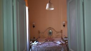 Postel nebo postele na pokoji v ubytování B&B Casa Laviano