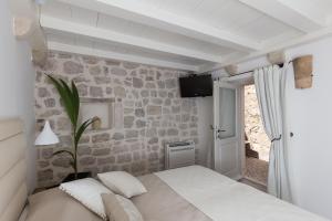 Postel nebo postele na pokoji v ubytování Dubrovnik Sweet House