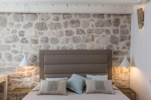 Postel nebo postele na pokoji v ubytování Dubrovnik Sweet House