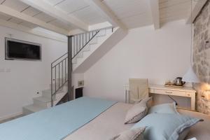 Postel nebo postele na pokoji v ubytování Dubrovnik Sweet House