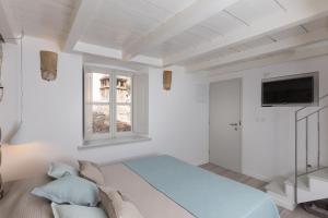 Postel nebo postele na pokoji v ubytování Dubrovnik Sweet House