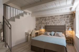 Postel nebo postele na pokoji v ubytování Dubrovnik Sweet House