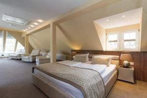Postel nebo postele na pokoji v ubytování HOTEL am STRAND