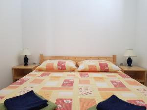 Postel nebo postele na pokoji v ubytování Apartment Ruzmarin