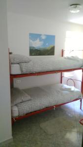 Postel nebo postele na pokoji v ubytování Residence Arvinei