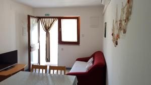 TV a/nebo společenská místnost v ubytování Apartment Ruzmarin