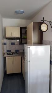 Kuchyň nebo kuchyňský kout v ubytování Apartment Ruzmarin
