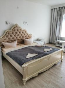 Postel nebo postele na pokoji v ubytování Villa Amadea