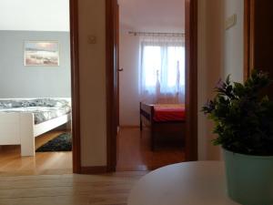 Postel nebo postele na pokoji v ubytování I & S Apartments