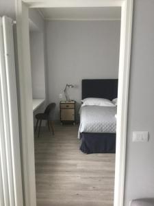 Postel nebo postele na pokoji v ubytování Dimora 16 Rooms & Garden