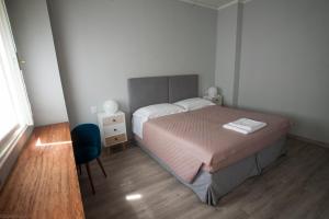 Postel nebo postele na pokoji v ubytování Dimora 16 Rooms & Garden