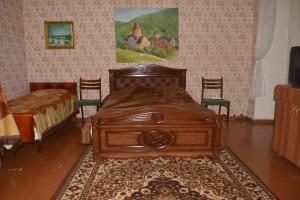 En eller flere senge i et værelse på SUNNY SWEET HOME