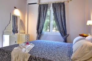 Posteľ alebo postele v izbe v ubytovaní Veroniki Penthouse Deluxe Apartment