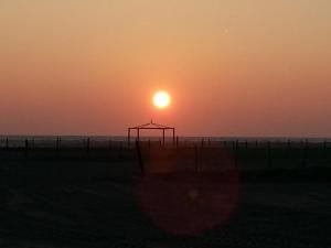The sunrise or sunset as seen from Az üdülőközpontot or nearby