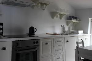 Kuchyň nebo kuchyňský kout v ubytování Apartments Christine