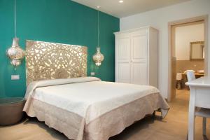 Postel nebo postele na pokoji v ubytování Hypnos Boutique Hotel